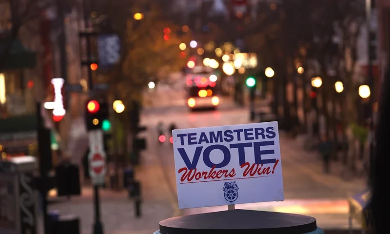 MADISON, WISCONSIN - NOVEMBER 07: A union vote sign is displayed in front of the state capital building during a rally to support democratic candidates hosted by the Teamsters on November 7, 2022 in Madison, Wisconsin. Voters in Wisconsin and around the country go to the polls tomorrow in an election that threatens to tip the balance of power in the U.S. Congress and the leadership of several state governments. (Photo by Scott Olson/Getty Images)
