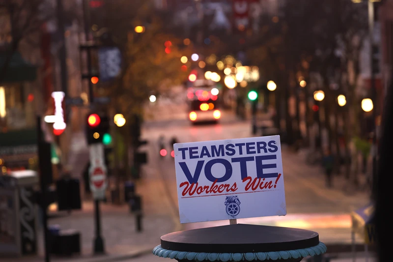 MADISON, WISCONSIN - NOVEMBER 07: A union vote sign is displayed in front of the state capital building during a rally to support democratic candidates hosted by the Teamsters on November 7, 2022 in Madison, Wisconsin. Voters in Wisconsin and around the country go to the polls tomorrow in an election that threatens to tip the balance of power in the U.S. Congress and the leadership of several state governments. (Photo by Scott Olson/Getty Images)