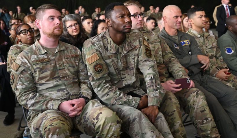 Attendees listen as US President Joe Biden delivers remarks to service members, first responders, and their families on the 22nd anniversary of the September 11, 2001, terrorist attacks, at Joint Base Elmendorf-Richardson in Anchorage, Alaska, on September 11, 2023. (Photo by SAUL LOEB / AFP) (Photo by SAUL LOEB/AFP via Getty Images)