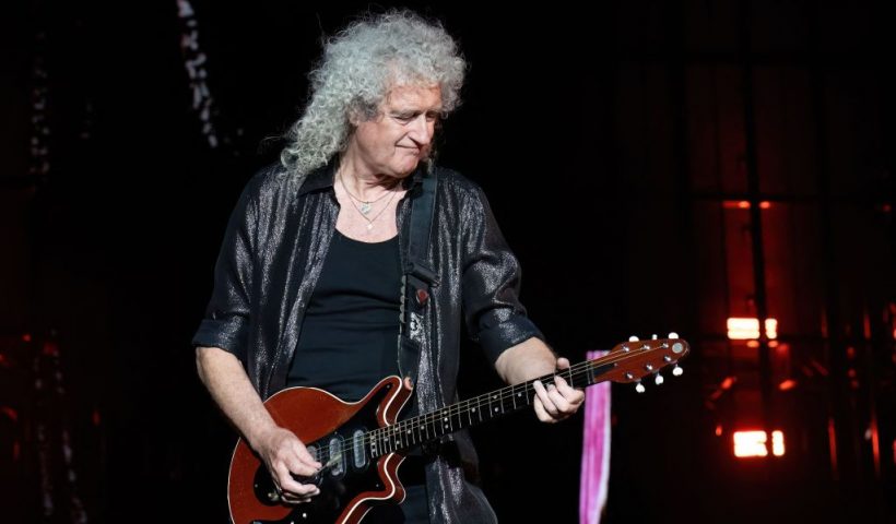 British musician Brian May of band Queen + Adam Lambert, performs at the Circuit of the Americas in Austin, Texas, on October 21, 2023, on the eve of the United States Formula One Grand Prix. (Photo by SUZANNE CORDEIRO / AFP) (Photo by SUZANNE CORDEIRO/AFP via Getty Images)