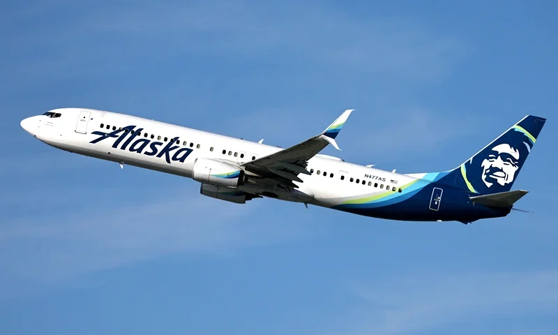 An Alaska Airlines plane takes off from Los Angeles International Airport (LAX) on December 4, 2023 in Los Angeles, California. Alaska Airlines has announced it plans to purchase rival Hawaiian Airlines in a $1.9 billion deal which must be approved by federal regulators. (Photo by Mario Tama/Getty Images)