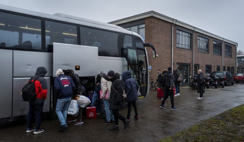 Asylum seekers from the AZC in Ter Apel arrive at the crisis shelter for asylum seekers in the student housing complex The Village in Groningen, on December 8 2023. The shelter must accommodate eighty to a hundred asylum seekers from Syria, Eritrea, Somalia, Iran, Iraq and Yemen, among others. The asylum seekers are expected to remain in the shelter for about three months while awaiting placement in a regular asylum seeker center. (Photo by Vincent Jannink / ANP / AFP) / Netherlands OUT (Photo by VINCENT JANNINK/ANP/AFP via Getty Images)