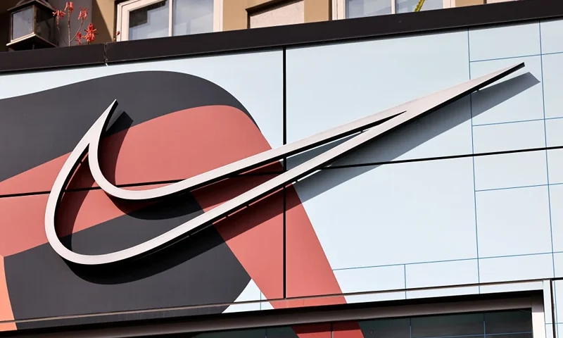 GLENDALE, CALIFORNIA - FEBRUARY 16: The Nike logo is displayed at a Nike Well Collective store on February 16, 2024 in Glendale, California. Nike announced it will be laying off 2 percent of its workforce worldwide, close to 1,700 employees. (Photo by Mario Tama/Getty Images)