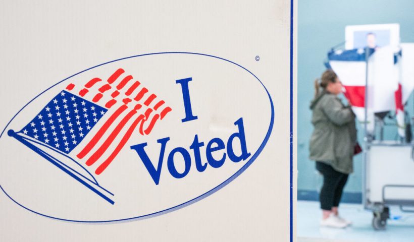 TOPSHOT - A voter casts their votes at a polling station in Nashville, Tennessee on Super Tuesday, March 5, 2024. Americans from 15 states and one territory vote simultaneously on "Super Tuesday," a campaign calendar milestone expected to leave Donald Trump a hair's breadth from securing the Republican Party's presidential nomination. (Photo by SETH HERALD / AFP) (Photo by SETH HERALD/AFP via Getty Images)