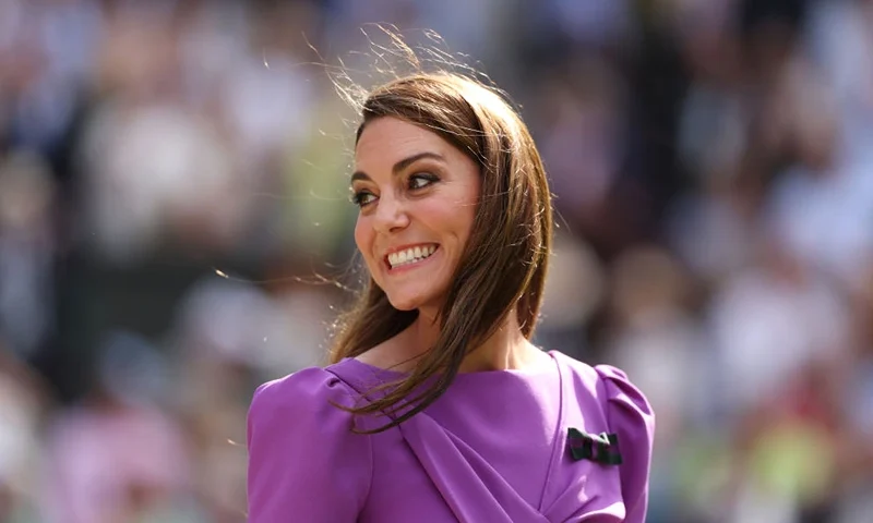 LONDON, ENGLAND - JULY 14: Catherine, Princess of Wales, Patron of The AELTC smiles prior to presenting Carlos Alcaraz of Spain with his trophy following victory against Novak Djokovic of Serbia in the Gentlemen's Singles Final during day fourteen of The Championships Wimbledon 2024 at All England Lawn Tennis and Croquet Club on July 14, 2024 in London, England. (Photo by Clive Brunskill/Getty Images)
