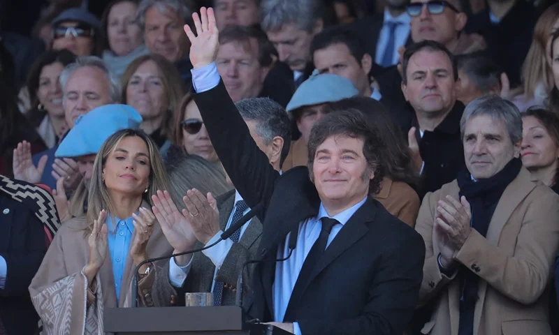 Argentinian President Javier Milei waves at the podium during the Argentine Rural Society's expo in Buenos Aires on July 28, 2024. (Photo by MARCOS BRINDICCI / AFP) (Photo by MARCOS BRINDICCI/AFP via Getty Images)