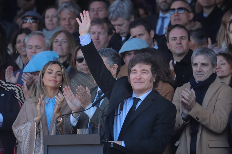 Argentinian President Javier Milei waves at the podium during the Argentine Rural Society's expo in Buenos Aires on July 28, 2024. (Photo by MARCOS BRINDICCI / AFP) (Photo by MARCOS BRINDICCI/AFP via Getty Images)