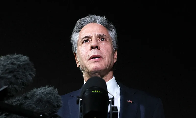 US Secretary of State Antony Blinken speaks to reporters on the tarmac in Doha on August 20, 2024. (Photo by Kevin MOHATT / POOL / AFP) (Photo by KEVIN MOHATT/POOL/AFP via Getty Images