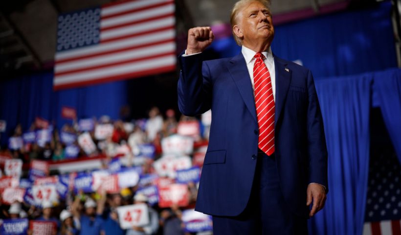 JOHNSTOWN, PENNSYLVANIA - AUGUST 30: Republican presidential nominee, former U.S. President Donald Trump takes the stage during a campaign rally in the 1st Summit Arena at the Cambria County War Memorial on August 30, 2024 in Johnstown, Pennsylvania. Promising to cut energy bills in half, conduct the largest deportation operation in history and put a 200% tariff on foreign made automobiles, Trump rallied his supporters in the all-important battleground state of Pennsylvania. (Photo by Chip Somodevilla/Getty Images)