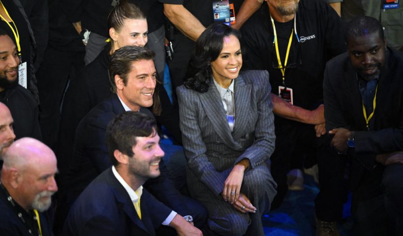US broadcaster David Muir (L) and US broadcaster Linsey Davis (R) pose for pictures with ABC News crew members at the end of a presidential debate with US Vice President and Democratic presidential candidate Kamala Harris and former US President and Republican presidential candidate Donald Trump at the National Constitution Center in Philadelphia, Pennsylvania, on September 10, 2024. (Photo by SAUL LOEB / AFP) (Photo by SAUL LOEB/AFP via Getty Images)