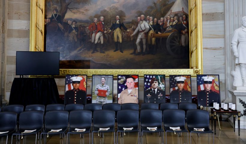 WASHINGTON, DC - SEPTEMBER 10: Images of the 13 American service members who died in the suicide bombing at Hamid Karzai International Airport in Afghanistan sit on display ahead of a Gold Medal Ceremony in the U.S. Capitol Rotunda on September 10, 2024 in Washington, DC. Senate and House leadership will attend the ceremony along with families of the 13 fallen service members. (Photo by Anna Moneymaker/Getty Images)