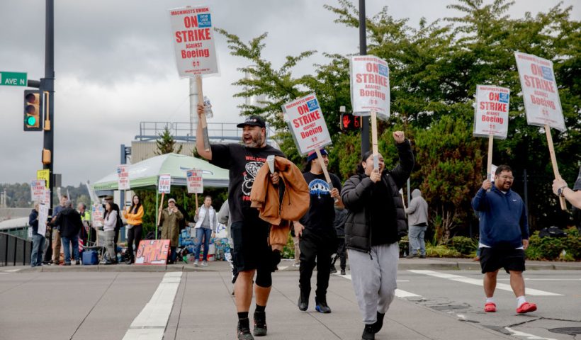 Striking Boeing workers and their supporters picket outside the Boeing Co. manufacturing facility in Renton, Washington, on September 16, 2024. In the first strike in 16 years, thousands of Boeing factory workers walked off the job in a dispute of pay that is likely to effect the manufacture of Boeing commercial planes. (Photo by Yehyun Kim / AFP) (Photo by YEHYUN KIM/AFP via Getty Images)