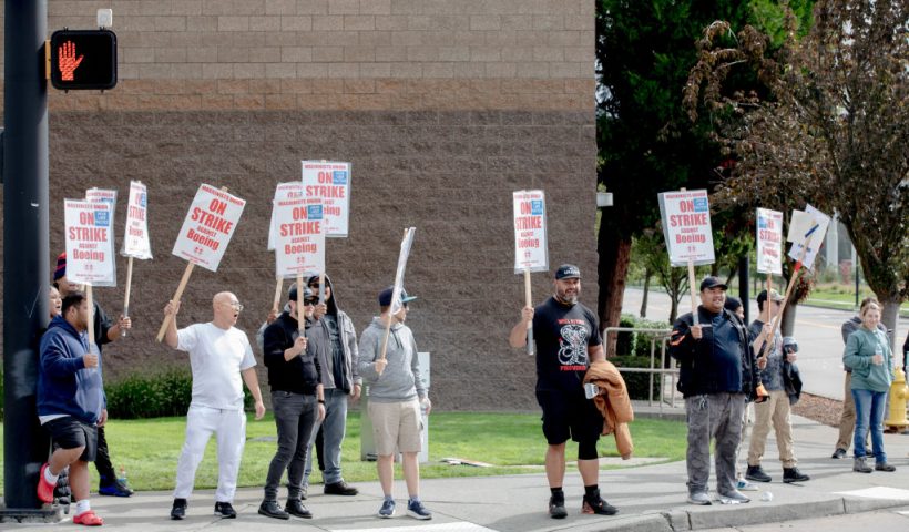 Striking Boeing workers and their supporters picket outside the Boeing Co. manufacturing facility in Renton, Washington on September 16, 2024. In the first strike in 16 years, thousands of Boeing factory workers walked off the job in a dispute of pay that is likely to effect the manufacture of Boeing commercial planes. (Photo by Yehyun Kim / AFP) (Photo by YEHYUN KIM/AFP via Getty Images)
