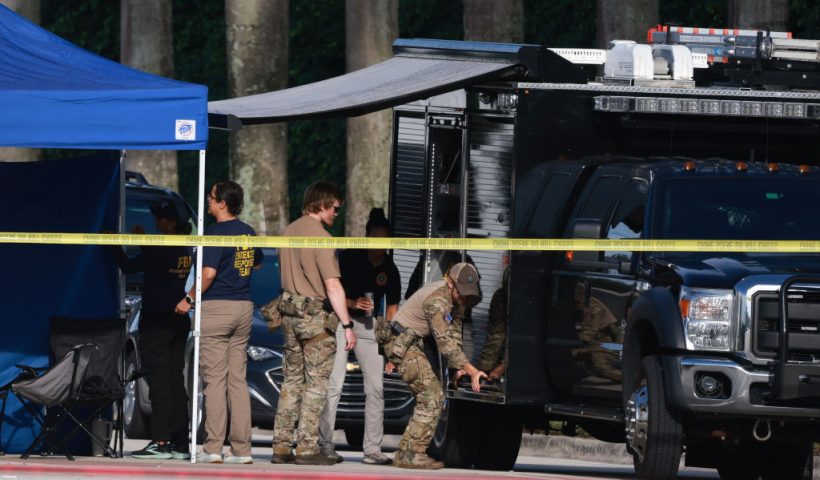 WEST PALM BEACH, FLORIDA - SEPTEMBER 16: Law enforcement personnel continue to investigate the area around Trump International Golf Club after an apparent assassination attempt on former President Donald Trump on September 16, 2024 in West Palm Beach, Florida. The FBI and U.S. Secret Service, along with the Palm Beach County Sheriff's office, are investigating the incident, which the FBI said "appears to be an attempted assassination of former President Trump" while he was golfing at Trump International Golf Club. (Photo by Joe Raedle/Getty Images)