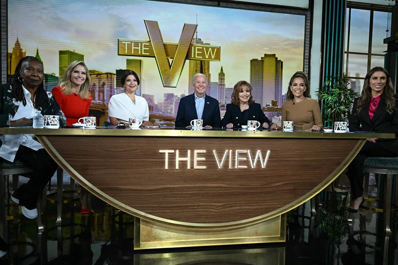 US President Joe Biden (C) attends a live interview on ABC's "The View" in New York on September 25, 2024. The hosts (L-R) are Whoopi Goldberg, Sara Haines, Ana Navarro, Joy Behar, Sunny Hostin, and Alyssa Farah Griffin. (Photo by ANDREW CABALLERO-REYNOLDS / AFP) (Photo by ANDREW CABALLERO-REYNOLDS/AFP via Getty Images)