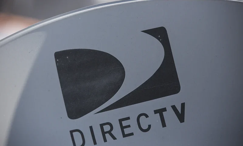 A DirecTV sattelite dish sits on a roof on May 19, 2014 in New York City. AT&T agreed May 18, to buy DirecTV for $48.5 billion. (Photo by Andrew Burton/Getty Images)