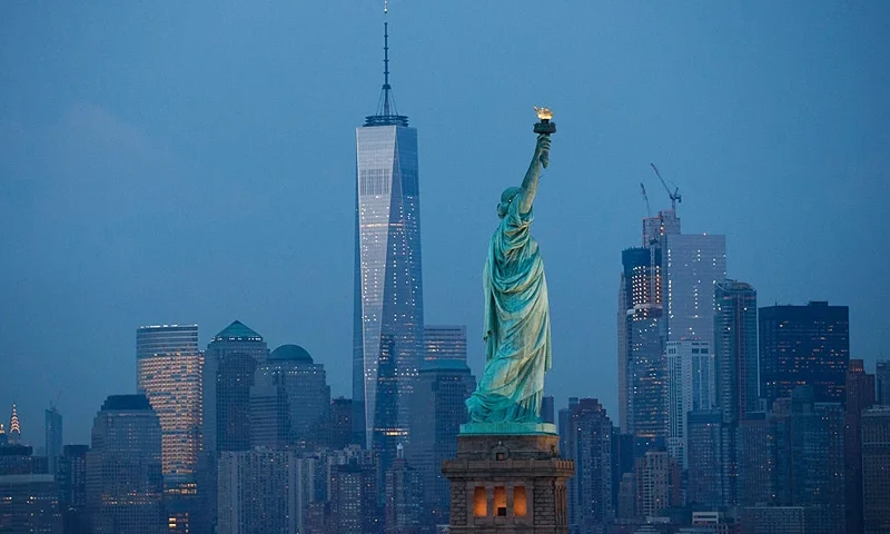 NEW YORK, NY - SEPTEMBER 8: in The Statue of Liberty stands in the foreground as Lower Manhattan is viewed at dusk, September 8, 2016 in New York City. New York City is preparing to mark the 15th anniversary of the September 11 terrorist attacks. (Photo by Drew Angerer/Getty Images)