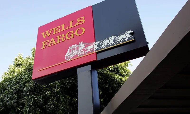The Wells Fargo logo is seen on a sign outside of a Wells Fargo Home Mortgage branch office March 20, 2007 in San Francisco, California. San Francisco based Wells Fargo & Co. announced today that it is cutting over 500 jobs in the home mortgage divisions in South Carolina, Arizona and California that cater to high-risk borrowers. (Photo by Justin Sullivan/Getty Images)