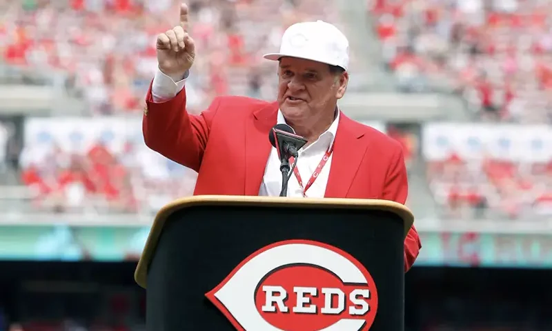 Cincinnati Reds former player Pete Rose speaks during a pregame ceremony of the unveiling of his bronze statue at Great American Ball Park. Mandatory Credit: David Kohl-USA TODAY Sports