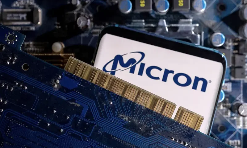 A smartphone with a displayed Micron logo is placed on a computer motherboard in this illustration taken March 6, 2023. REUTERS/Dado Ruvic/Illustration/File Photo