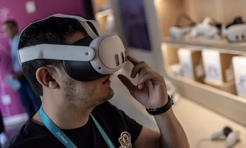 A guest attends a presentation of the updated virtual reality headset during the Meta Connect event at the company's headquarters in Menlo Park, California, U.S., September 27, 2023. REUTERS/Carlos Barria/File Photo