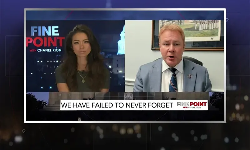 Video still from Fine Point on One America News Network showing a split screen of the host on the left side, and on the right side is the guest, Rep. Warren Davidson.