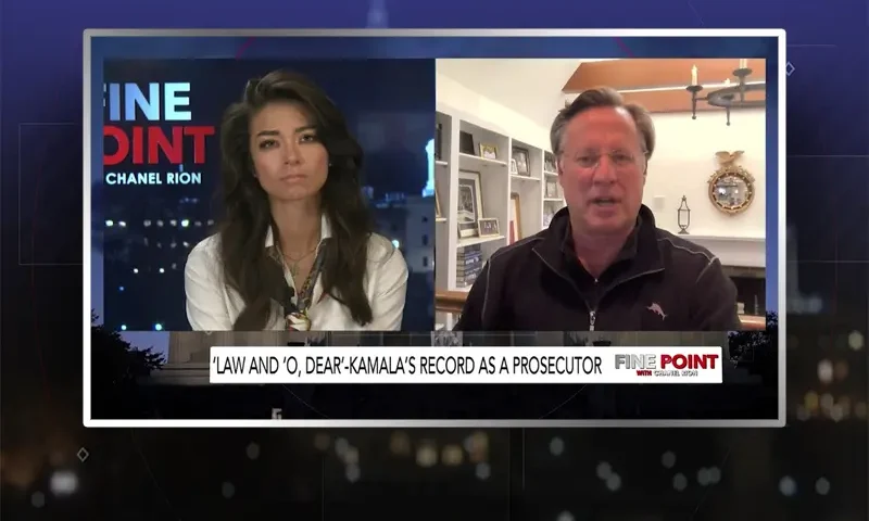 Video still from Fine Point on One America News Network showing a split screen of the host on the left side, and on the right side is the guest, Dave Brat.