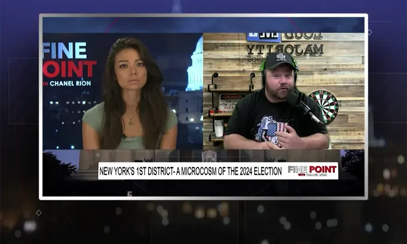 Video still from Fine Point on One America News Network showing a split screen of the host on the left side, and on the right side is the guest, Kevin Smith.