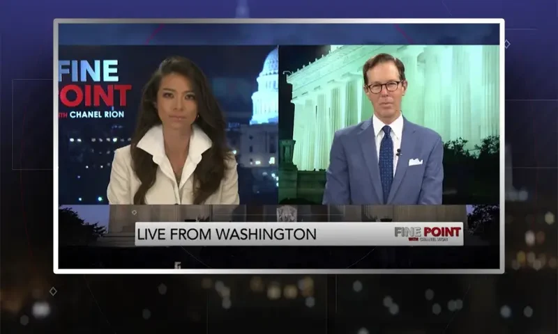 Video still from Fine Point on One America News Network showing a split screen of the host on the left side, and on the right side is the guest, John Hines.