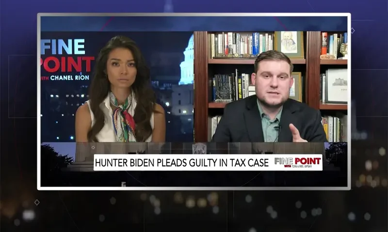 Video still from Fine Point on One America News Network showing a split screen of the host on the left side, and on the right side is the guest, Garrett Ziegler.