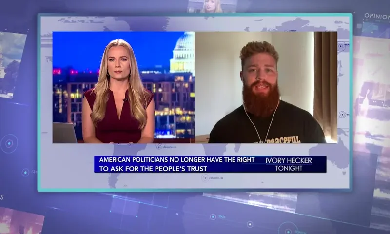Video still from Ivory Hecker Tonight on One America News Network showing a split screen of the host on the left side, and on the right side is the guest, Taylor Hansen.