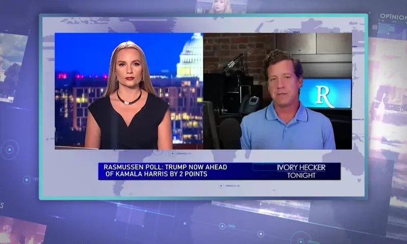 Video still from Ivory Hecker Tonight on One America News Network showing a split screen of the host on the left side, and on the right side is the guest, Mark Mitchell.