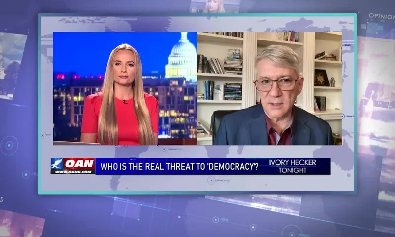 Video still from Ivory Hecker Tonight on One America News Network showing a split screen of the host on the left side, and on the right side is the guest, Steve Baker.