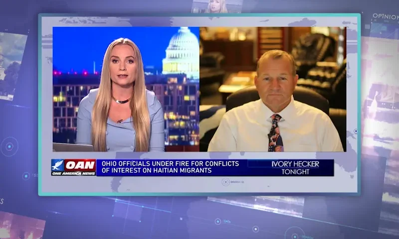 Video still from Ivory Hecker Tonight on One America News Network showing a split screen of the host on the left side, and on the right side is the guest, Rep. Troy Nehls.