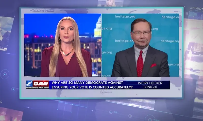 Video still from Ivory Hecker Tonight on One America News Network showing a split screen of the host on the left side, and on the right side is the guest, Hans Von Spakovsky.