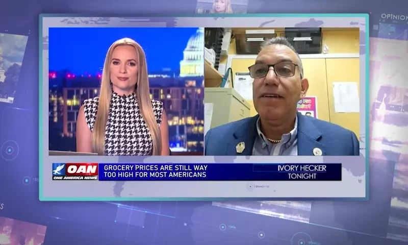 Video still from Ivory Hecker Tonight on One America News Network showing a split screen of the host on the left side, and on the right side is the guest, Carlos Collado.
