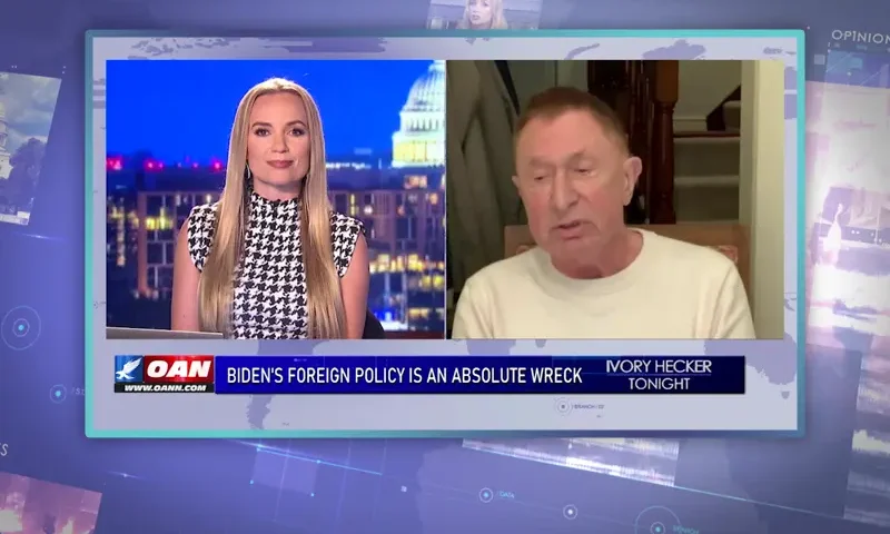 Video still from Ivory Hecker Tonight on One America News Network showing a split screen of the host on the left side, and on the right side is the guest, Andrew Kakabadse.