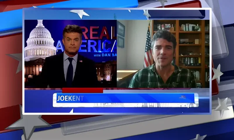 Video still from Real America on One America News Network showing a split screen of the host on the left side, and on the right side is the guest, Joe Kent.