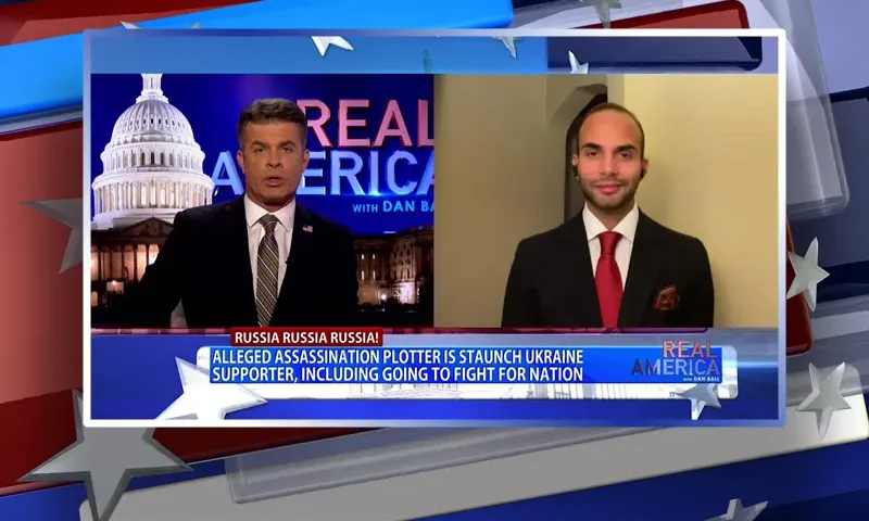 Video still from Real America on One America News Network showing a split screen of the host on the left side, and on the right side is the guest, George Papadopoulos.