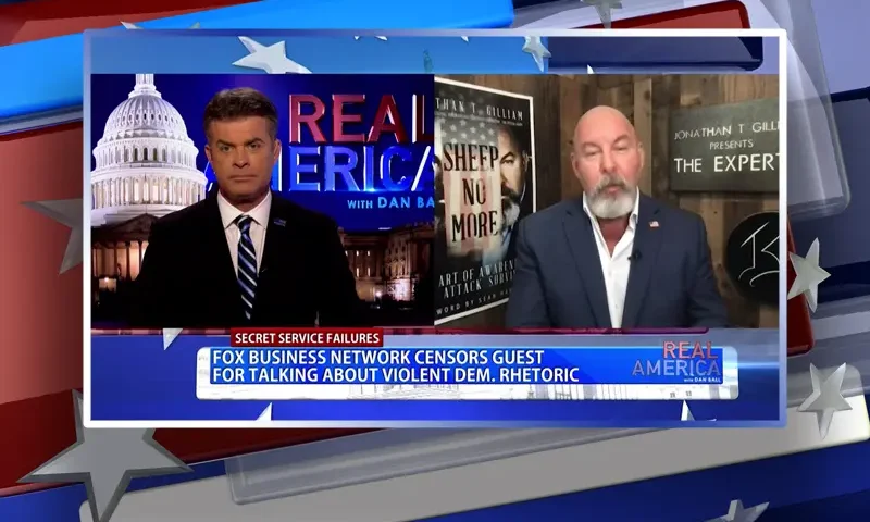 Video still from Real America on One America News Network showing a split screen of the host on the left side, and on the right side is the guest, Jonathan Gilliam.