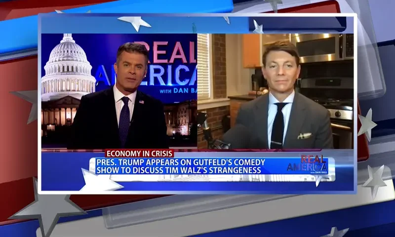 Video still from Real America on One America News Network showing a split screen of the host on the left side, and on the right side is the guest, Hogan Gidley.