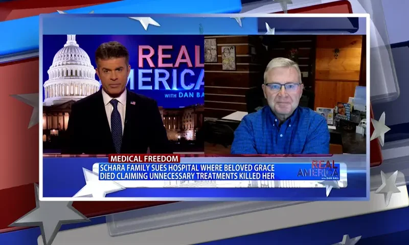 Video still from Real America on One America News Network showing a split screen of the host on the left side, and on the right side is the guest, Scott Schara.