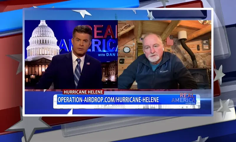 Video still from Real America on One America News Network showing a split screen of the host on the left side, and on the right side is the guest, Doug Jackson.