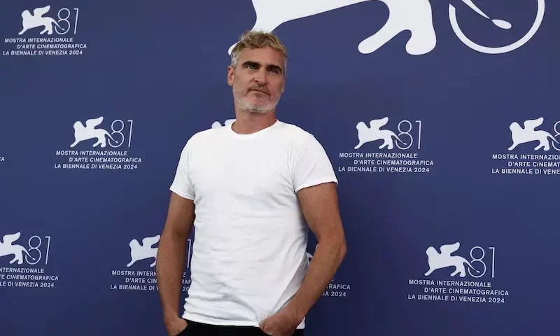 Cast member Joaquin Phoenix poses during a photocall for the movie "Joker: Folie a Deux", in competition, at the 81st Venice Film Festival, Venice, Italy, September 4, 2024. REUTERS/Yara Nardi