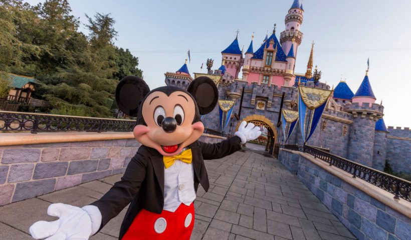 ANAHEIM, CA - AUGUST 27: Mickey Mouse poses in front of Sleeping Beauty Castle at Disneyland Park on August 27, 2019 in Anaheim, California. Disneyland plans to reopen on April 30, 2021. (Photo Joshua Sudock/Walt Disney World Resorts via Getty Images)