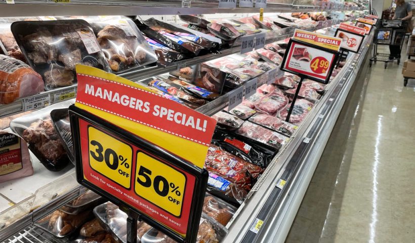 A sign announces a sale for meat at a Safeway grocery store in Annapolis, Maryland, on May 16, 2022, as Americans brace for summer sticker shock as inflation continues to grow. (Photo by Jim WATSON / AFP) (Photo by JIM WATSON/AFP via Getty Images)