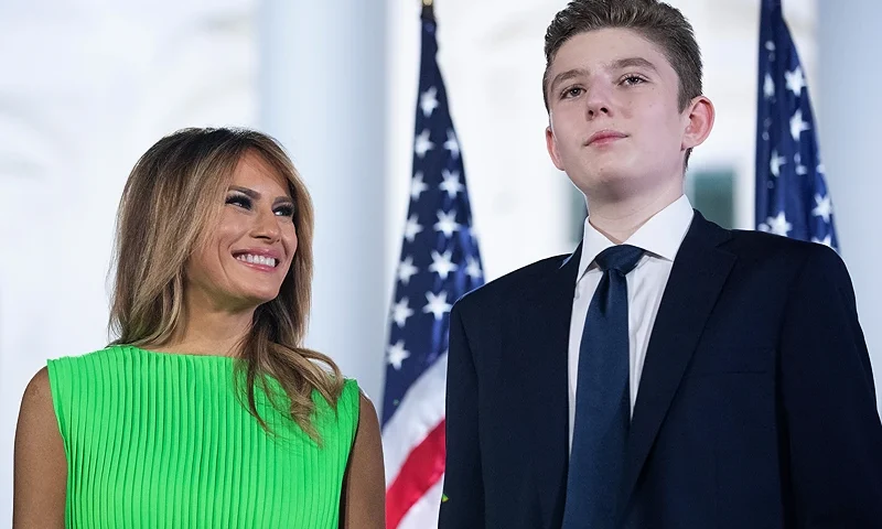 WASHINGTON, DC - AUGUST 27: First lady Melania Trump (L) looks at her son Barron Trump after U.S. President Donald Trump delivered his acceptance speech for the Republican presidential nomination on the South Lawn of the White House August 27, 2020 in Washington, DC. Trump gave the speech in front of 1500 invited guests. (Photo by Chip Somodevilla/Getty Images)