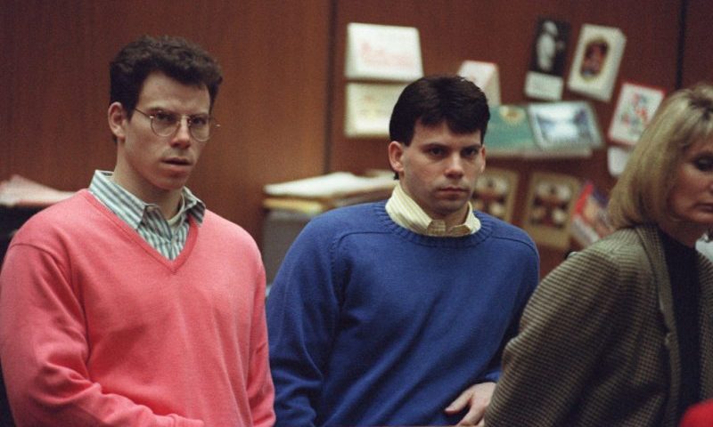 Erik Menendez (L) and his brother Lyle (R) listen during a pre-trial hearing, on December 29, 1992 in Los Angeles after the two pleaded innocent in the August 1989 shotgun deaths of their wealthy parents, Jose and Mary Louise Menendez of Beverly Hills, Calif. It took 40 months for the Superior Court arraignment after prosecutors and defense attorneys battled over the admissibility of taped confessions the brothers allegedly made to their psychotherapist. AFP PHOTO VINCE BUCCI (Photo by VINCE BUCCI / AFP) (Photo by VINCE BUCCI/AFP via Getty Images)