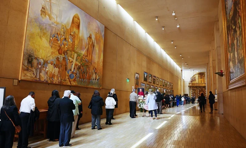 LOS ANGELES, CALIFORNIA - MARCH 02: Mourners wait in line to attend the public viewing for Archdiocese of Los Angeles Auxiliary Bishop David G. O'Connell, part of three days of memorial services, at the Cathedral of Our Lady of the Angels on March 2, 2023 in Los Angeles, California. O'Connell, a native of Ireland, was a beloved member of the South L.A. community where he ministered for 27 years and was shot and killed inside his home in Hacienda Heights on February 18. Archbishop José H. Gomez called O'Connell ‘a peacemaker with a heart for the poor and the immigrant.’ (Photo by Mario Tama/Getty Images)
