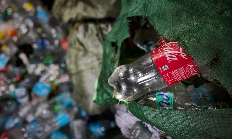 MANILA, PHILIPPINES - APRIL 11: Plastic bottles for recycling are seen at a junkshop on April 11, 2023 in Manila, Philippines. The Philippines is the largest ocean polluter in the world, contributing a third of the 80% of global ocean plastic that comes from Asian rivers, according to a 2021 report by Oxford University's Our World in Data. Poverty has led the Philippines to become a "sachet economy" that consumes 163 million sachets every day, worsening marine plastic pollution in the region. The trash is piling up on land, clogging coastlines, spilling into the sea, and traveling to remote corners of the globe, as the country fails to meet targets for improved waste management that it signed into law more than two decades ago. According to Greenpeace, global corporations trap low-income customers in developing countries like the Philippines to buy - and buy often - fast-moving consumer goods in small quantities packaged in cheap, disposable plastics as part of a strategy to drive market share and profits. Break Free From Plastic’s 2022 Brand Audit Report revealed that the Coca-Cola Company, Philip Morris International, Universal Robina Corporation (URC), Philippine Spring Water Resources, Inc., and Japan Tobacco International are the worst plastic polluters in the country. Globally, Coca-Cola also leads the list for five years in a row, followed by PepsiCo, Nestle, Mondelez International, and Unilever – all consistently part of the annual top 10. (Photo by Ezra Acayan/Getty Images)